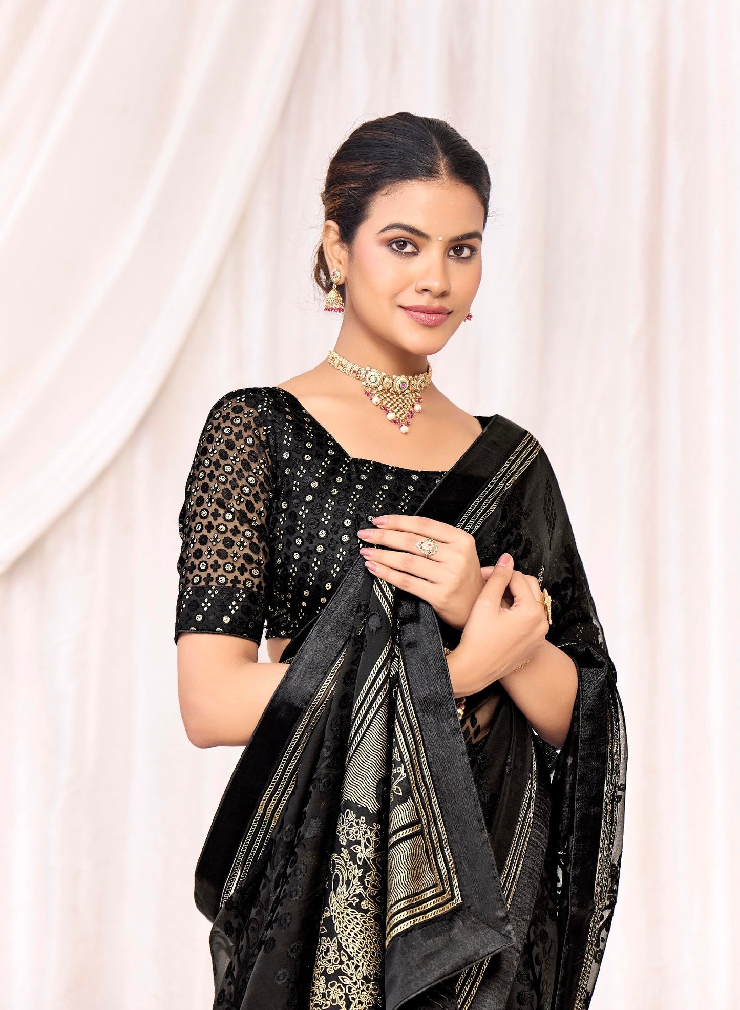 Pure Brasso fabric with Black Designed with Featuring Silver and Gold Foil Touch with Rich Traditional Border Ideal for Day to Evening Events.