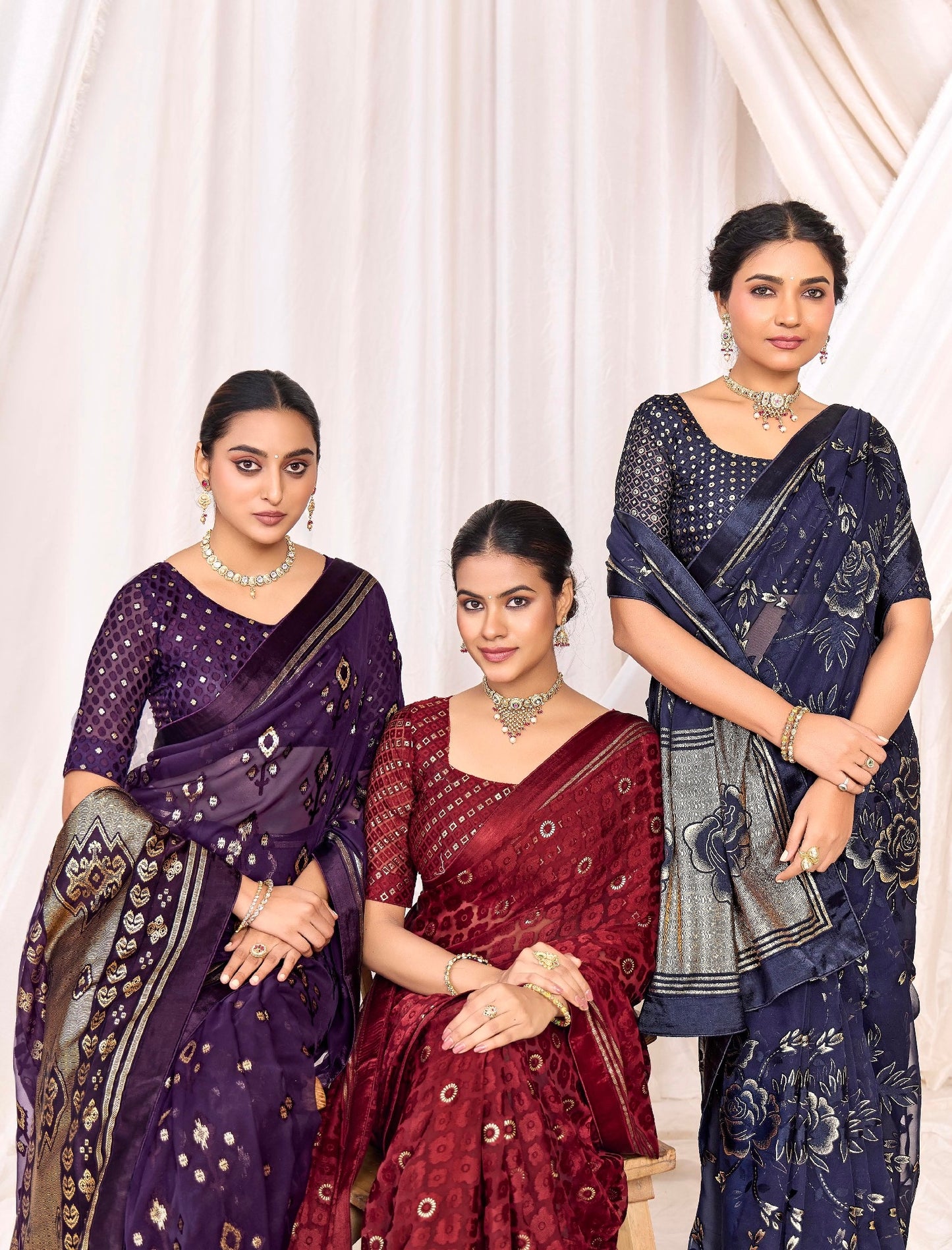 Pure Brasso fabric with Exclusive Deep Purple colored Designed with Featuring Interactive Gold & Silver Foil Touch with Rich Traditional Border Ideal for Day to Evening Events.