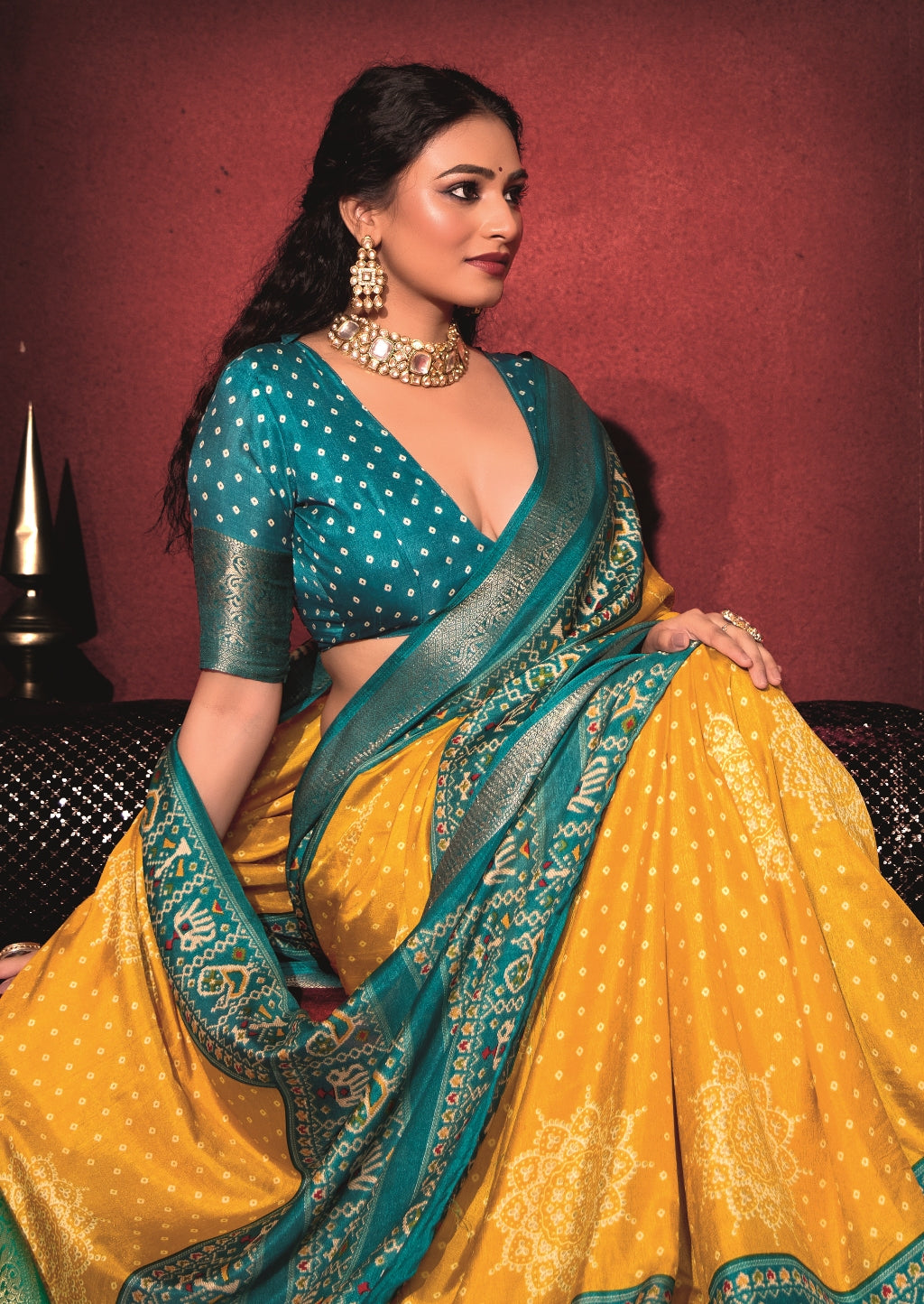 Pure Silk fabric with Lemon Yellow and Turquoise Blue Dual color Combination of Exclusive Bandhej print with Rich Look Jacquard Border Exclusive Look Saree