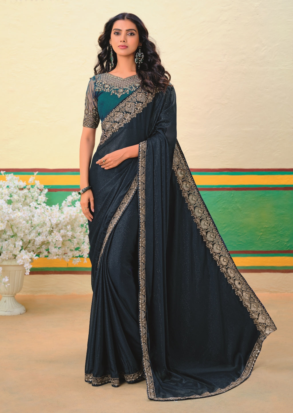 Navy Blue Girlish Look Saree with a Heavy Blouse and Heavy Border