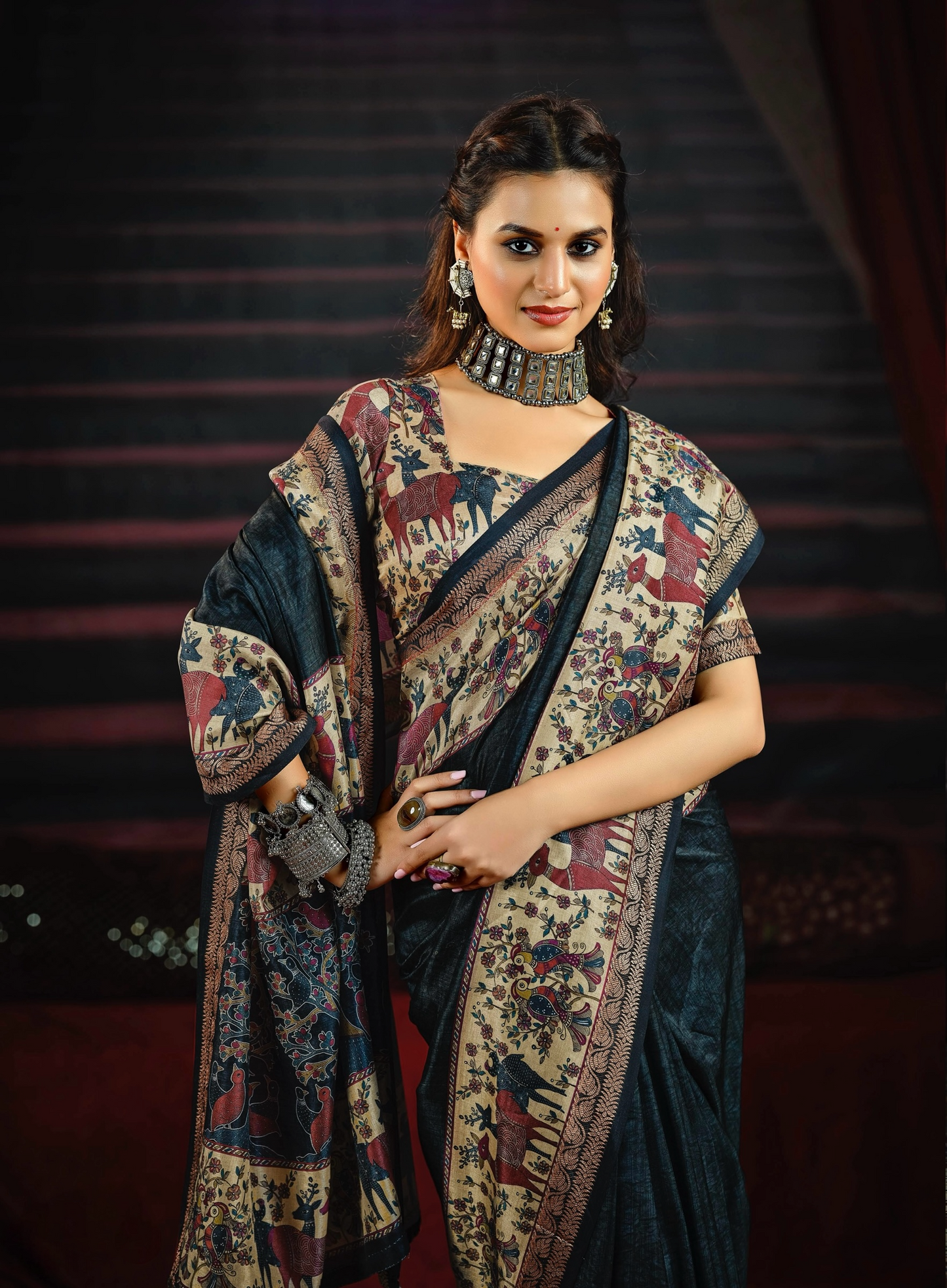 Elegant Black Saree with Traditional Animal and Floral Motifs, Featuring Richly Detailed Pallu and Border, Perfect for Festive and Ethnic occasions