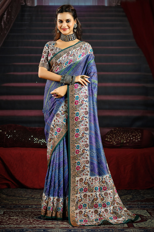 Elegant Blue Saree Adorned with Colorful Floral and Paisley Motifs, Featuring a Detailed Border and Pallu, Perfect for Festive and Special Occasions