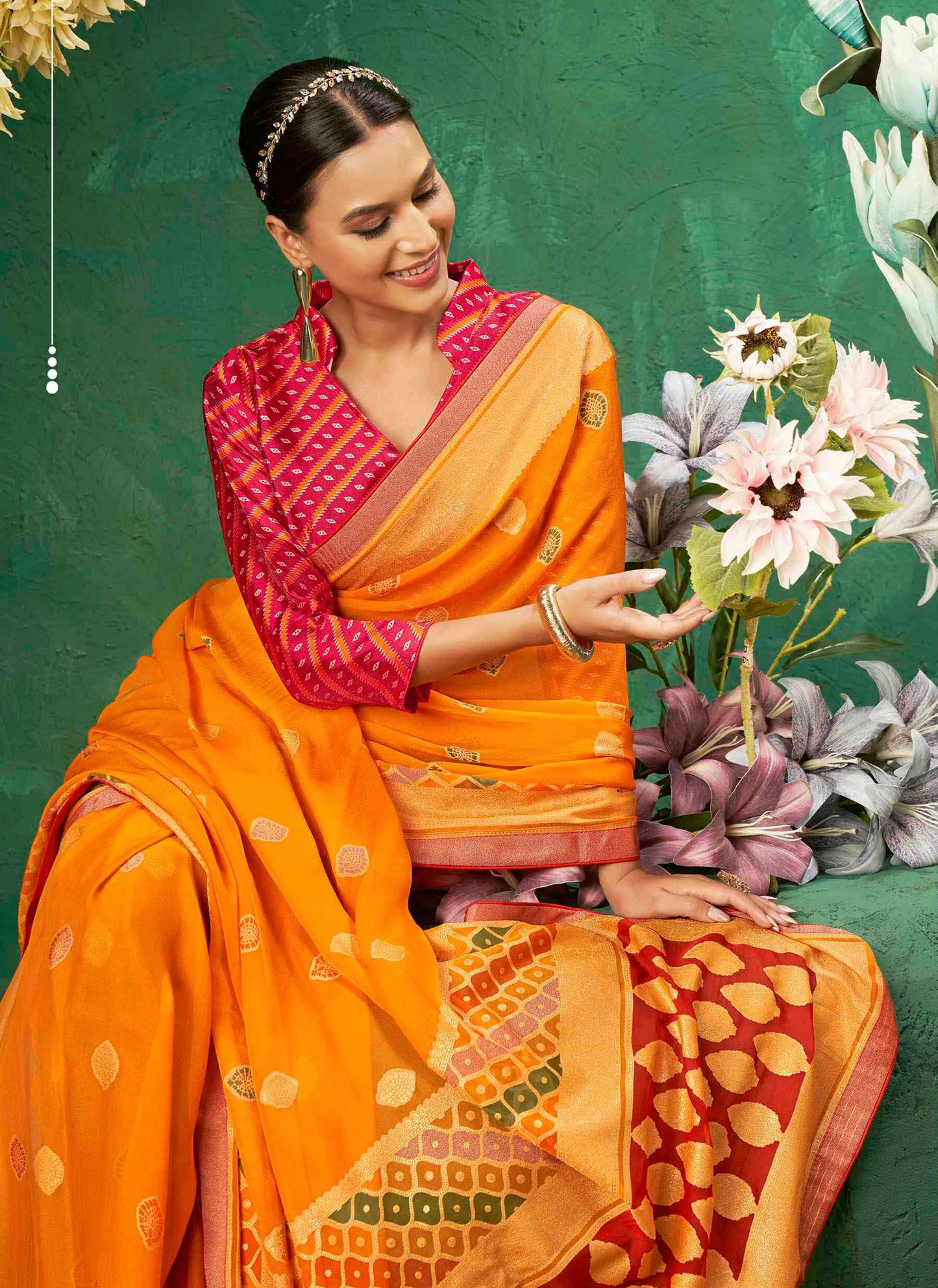 Exclusive Brasso fabric with Vibrant Orange color Designed with Delicate Self Motifs and a Luxurious Contrasting Border Perfect for Festive Events, Weddings, and Bright Celebrations.