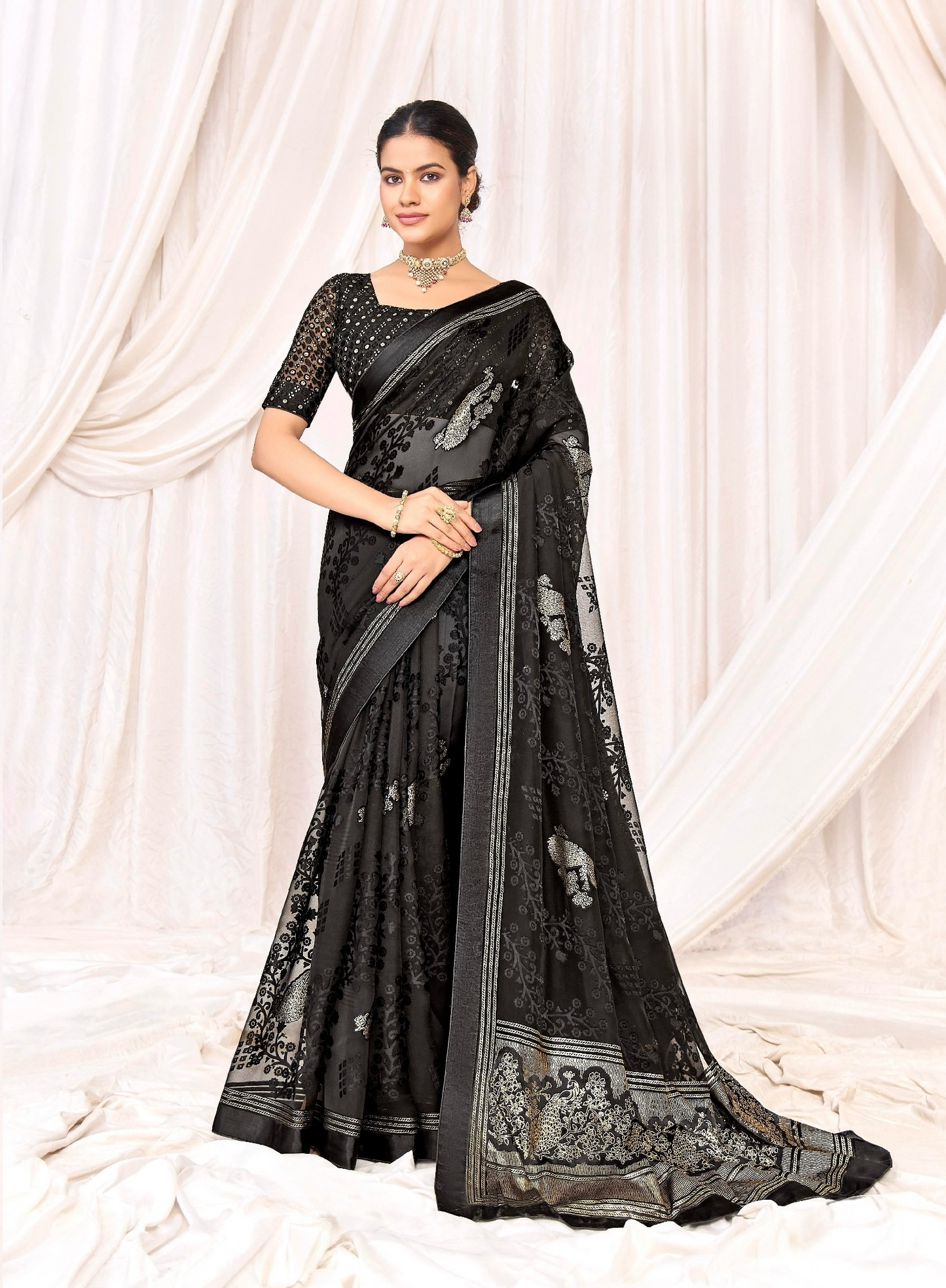 Pure Brasso fabric with Black Designed with Featuring Silver and Gold Foil Touch with Rich Traditional Border Ideal for Day to Evening Events.