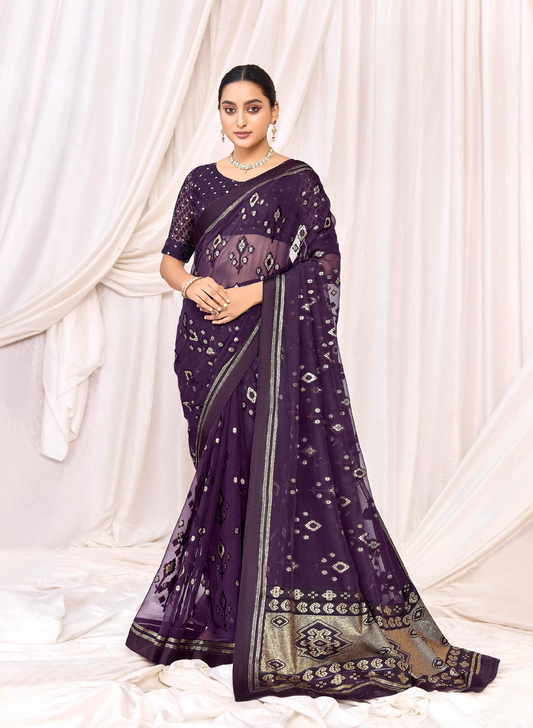 Pure Brasso fabric with Exclusive Deep Purple colored Designed with Featuring Interactive Gold & Silver Foil Touch with Rich Traditional Border Ideal for Day to Evening Events.