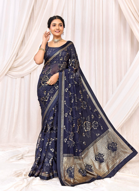 Pure Brasso fabric with Exclusive Deep Navy Blue colored Designed with Featuring Interactive Gold & Silver Foil Touch with Rich Traditional Border Ideal for Day to Evening Events.