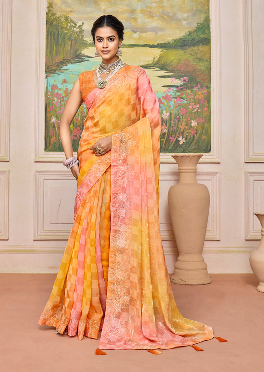 Elegant Pastel Orange and Pink Brasso Saree with a Checkered Design and Delicate Embroidery with Heavy Sequence Blouse Perfect for Festive and Special Occasions