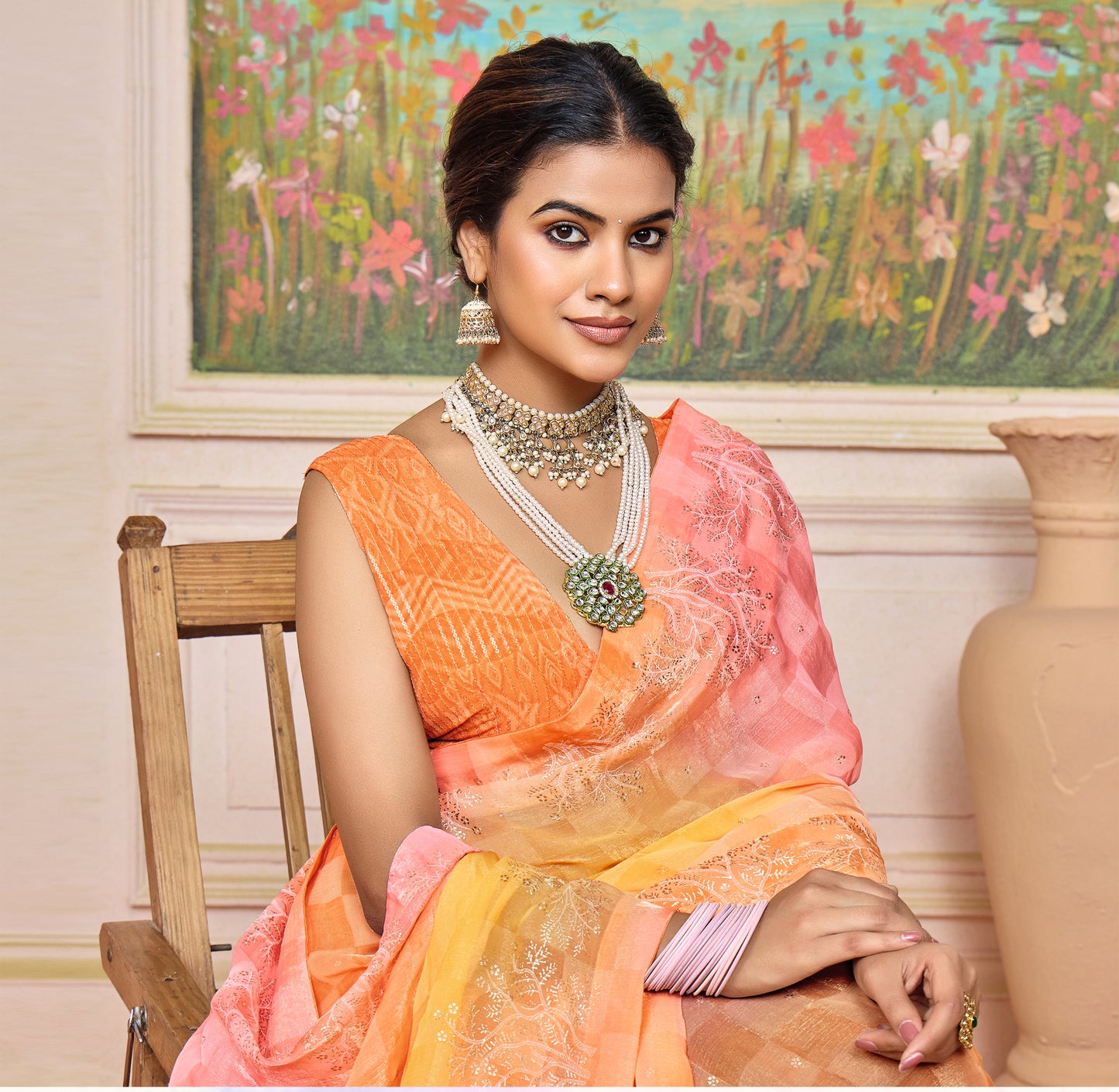 Elegant Pastel Orange and Pink Brasso Saree with a Checkered Design and Delicate Embroidery with Heavy Sequence Blouse Perfect for Festive and Special Occasions