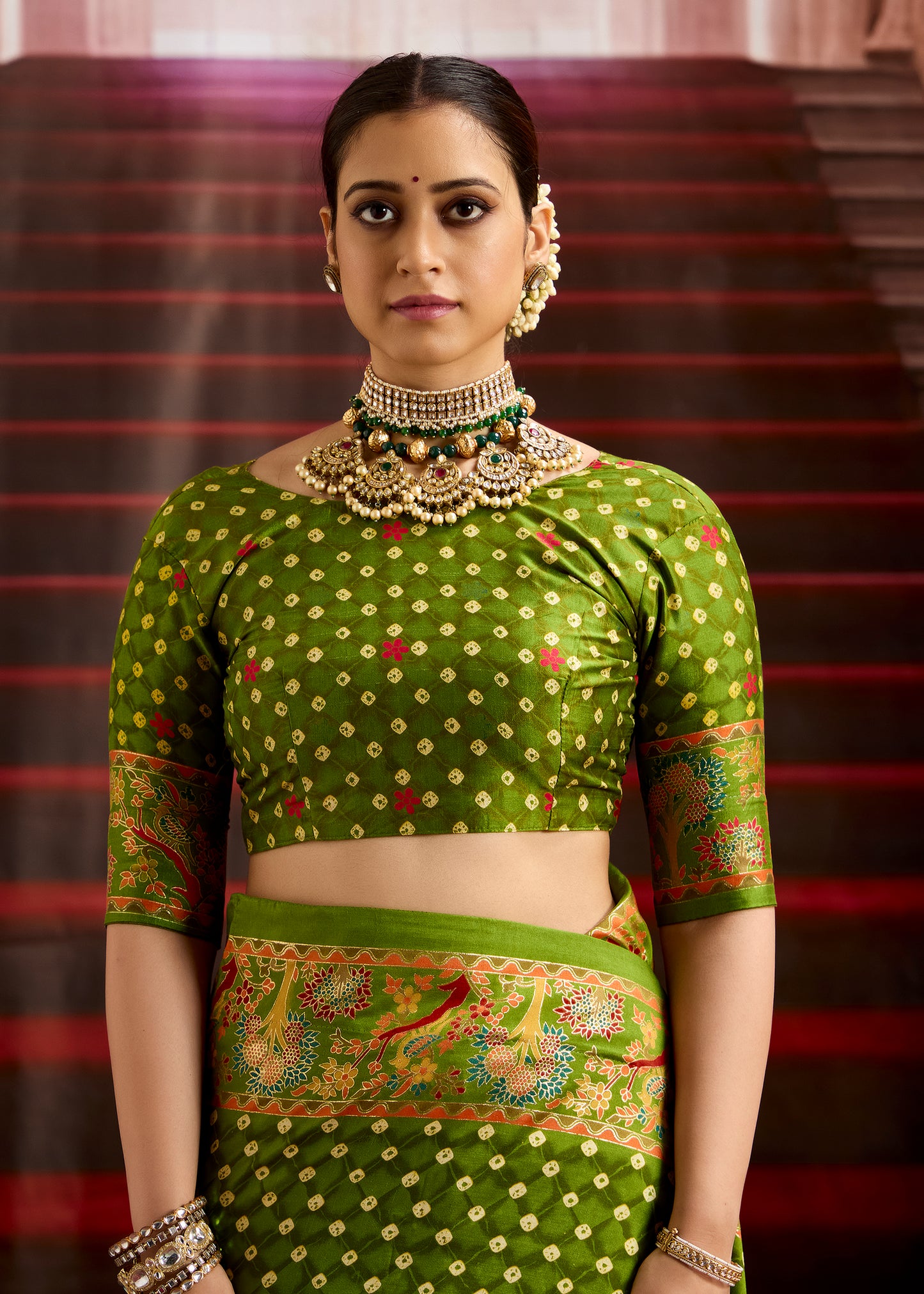 Henna Green Wealvet Tusser Silk fabric with Attractive Kalamkari Hand Painted and Foil Touch with Exclusive Bandhej Print & Grounded Tussels.