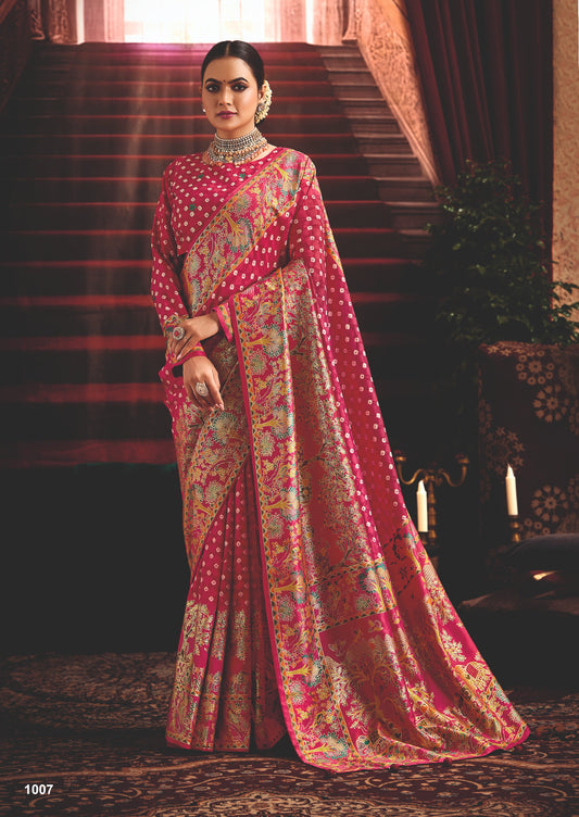 Rani Pink Wealvet Tusser Silk fabric with Attractive Kalamkari Hand Painted and Foil Touch with Exclusive Bandhej Print & Grounded Tussels.