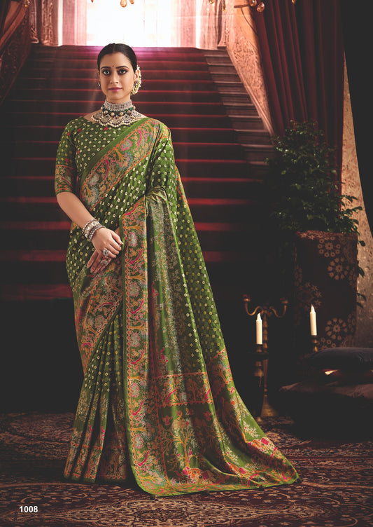 Henna Green Wealvet Tusser Silk fabric with Attractive Kalamkari Hand Painted and Foil Touch with Exclusive Bandhej Print & Grounded Tussels.