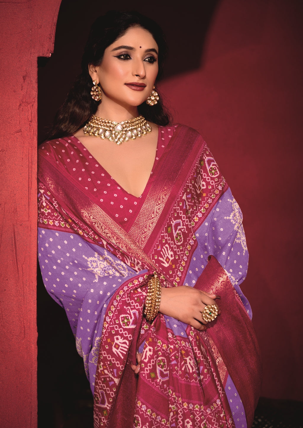Pure Silk fabric with Slate Blue and Red Dual color Combination of Exclusive Bandhej print with Rich Look Jacquard Border Exclusive Look Saree