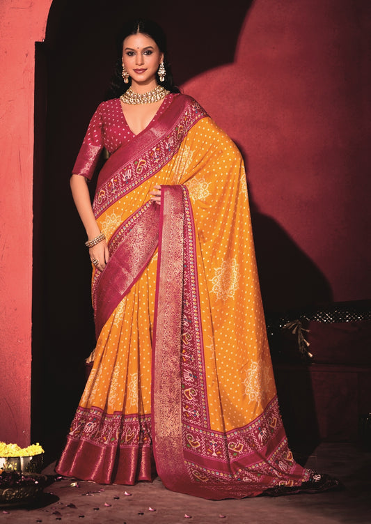 Pure Silk fabric with Turmeric Yellow and Red Dual color Combination of Exclusive Bandhej print with Rich Look Jacquard Border Exclusive Look Saree