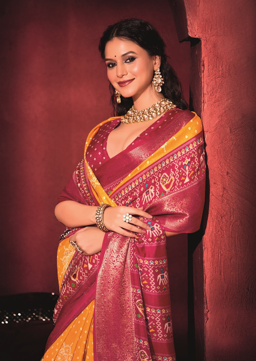 Pure Silk fabric with Turmeric Yellow and Red Dual color Combination of Exclusive Bandhej print with Rich Look Jacquard Border Exclusive Look Saree