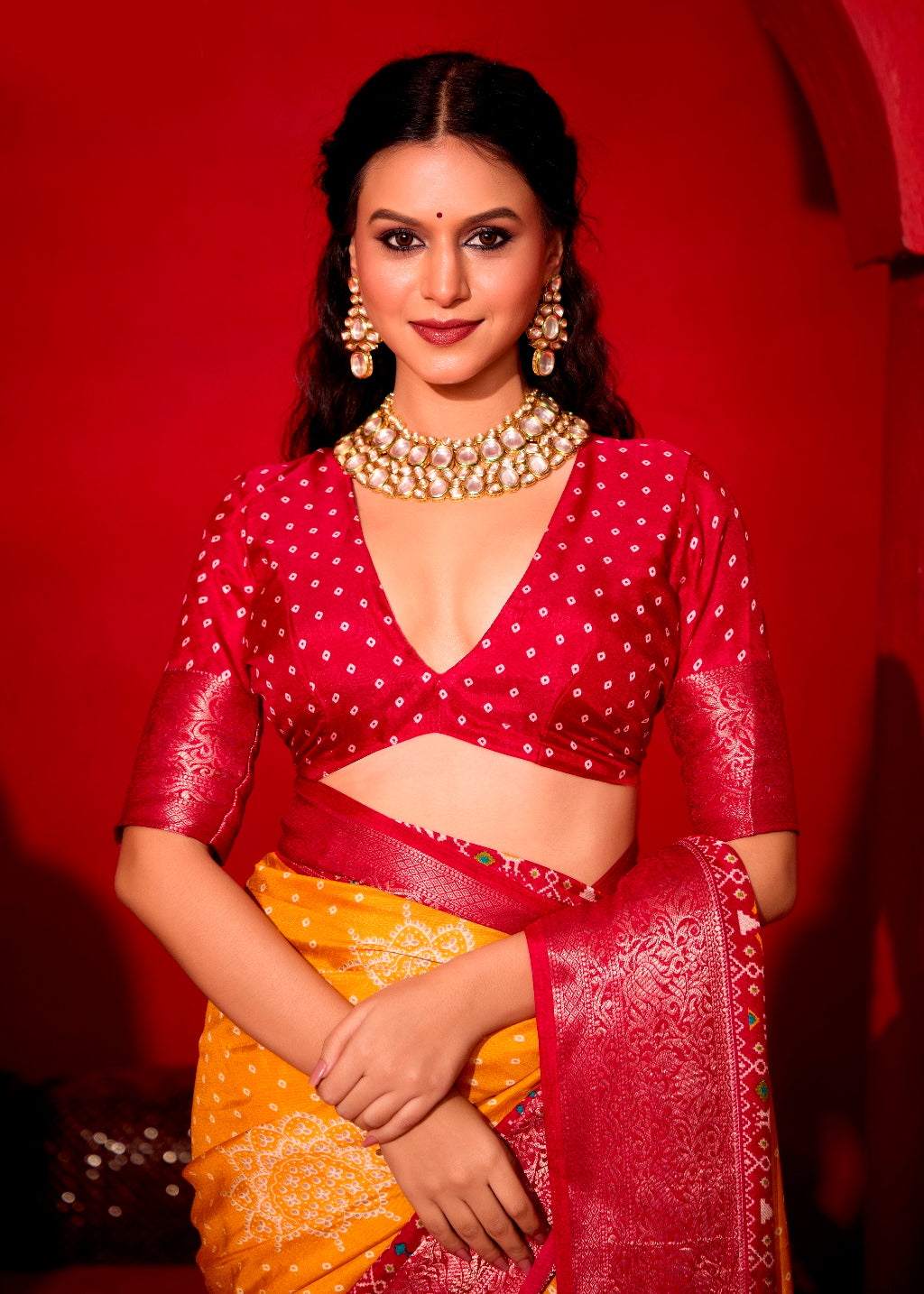 Pure Silk fabric with Turmeric Yellow and Red Dual color Combination of Exclusive Bandhej print with Rich Look Jacquard Border Exclusive Look Saree