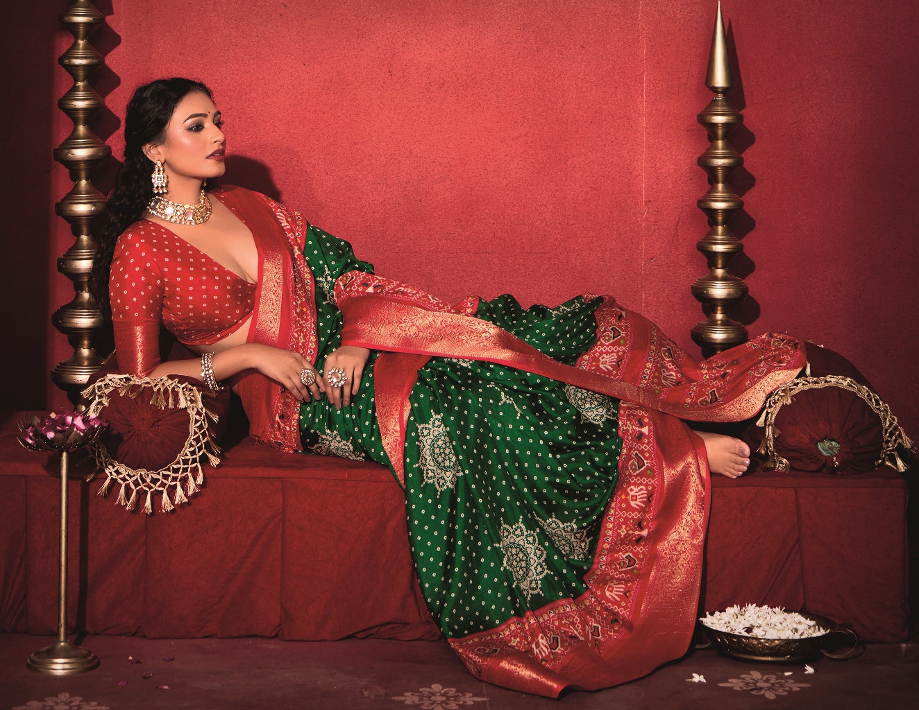 Pure Silk fabric with Dark Green and Red Dual color Combination of Exclusive Bandhej print with Rich Look Jacquard Border Exclusive Look Saree