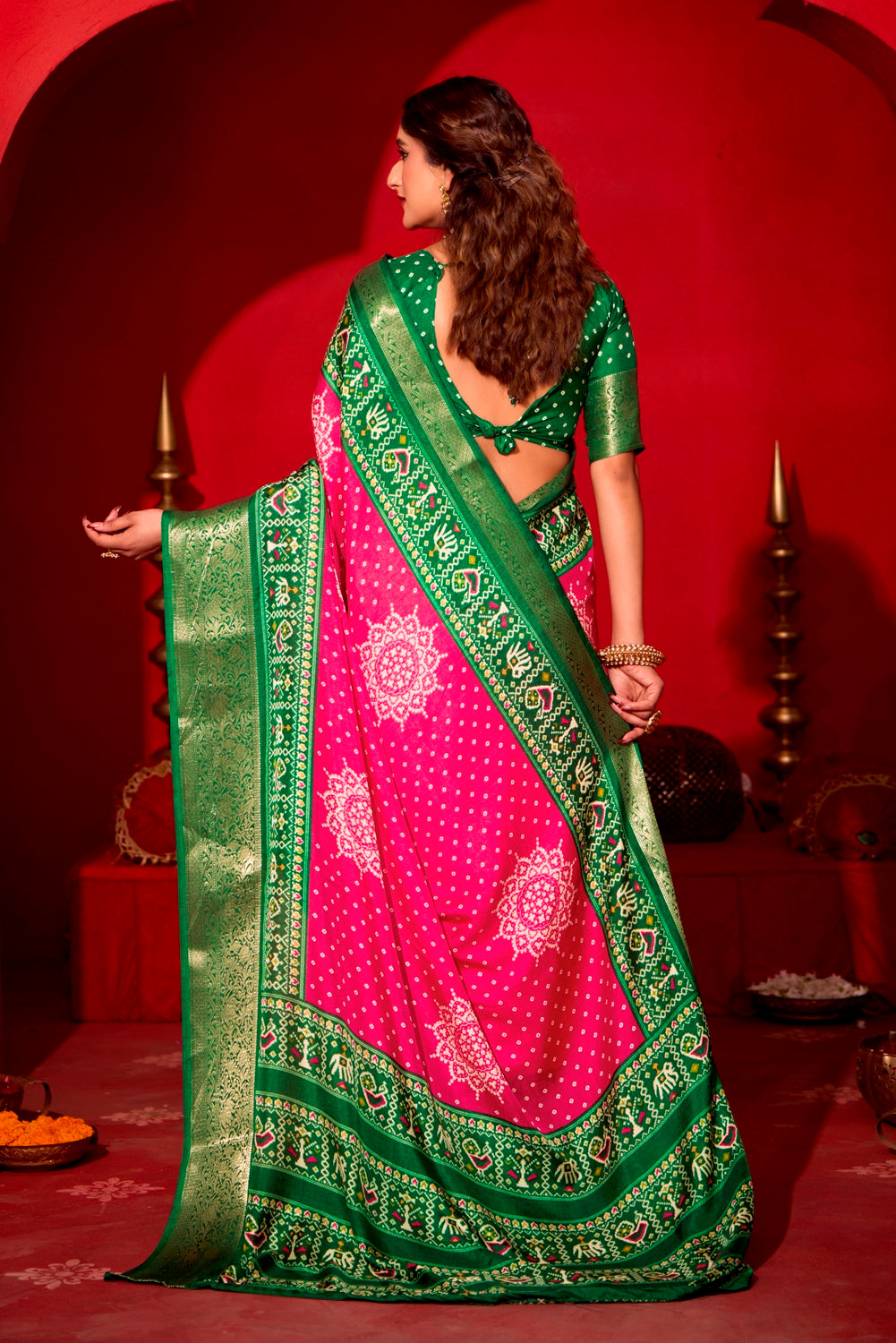 Pure Silk fabric with Magenta Pink and Dark Green Dual color Combination of Exclusive Bandhej print with Rich Look Jacquard Border Exclusive Look Saree