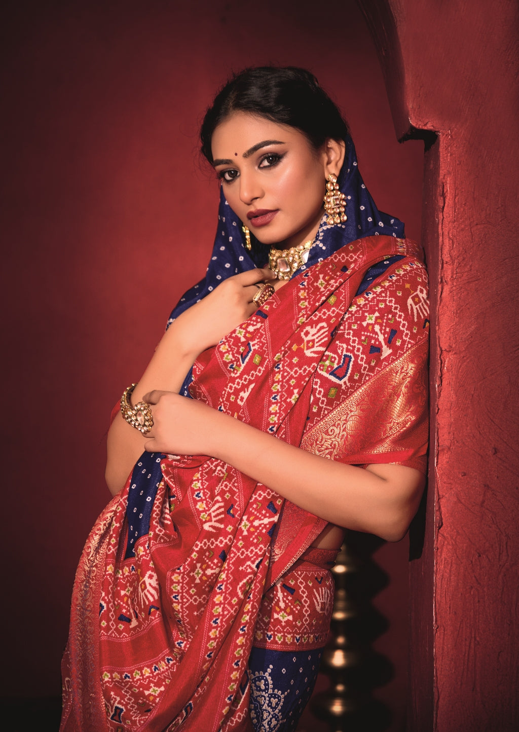 Pure Silk fabric with Royal Blue and Red Dual color Combination of Exclusive Bandhej print with Rich Look Jacquard Border Exclusive Look Saree