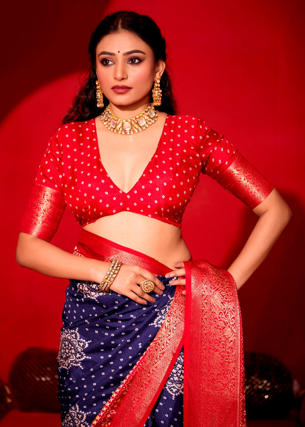 Pure Silk fabric with Royal Blue and Red Dual color Combination of Exclusive Bandhej print with Rich Look Jacquard Border Exclusive Look Saree