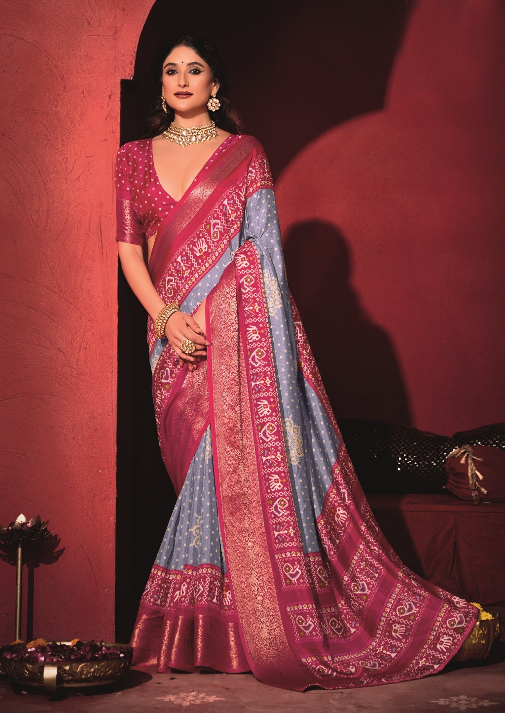 Pure Silk fabric with Exclusive Light Levender and Cherry Red Dual color Combination of Exclusive Bandhej print with Rich Look Jacquard Border Exclusive Look Saree