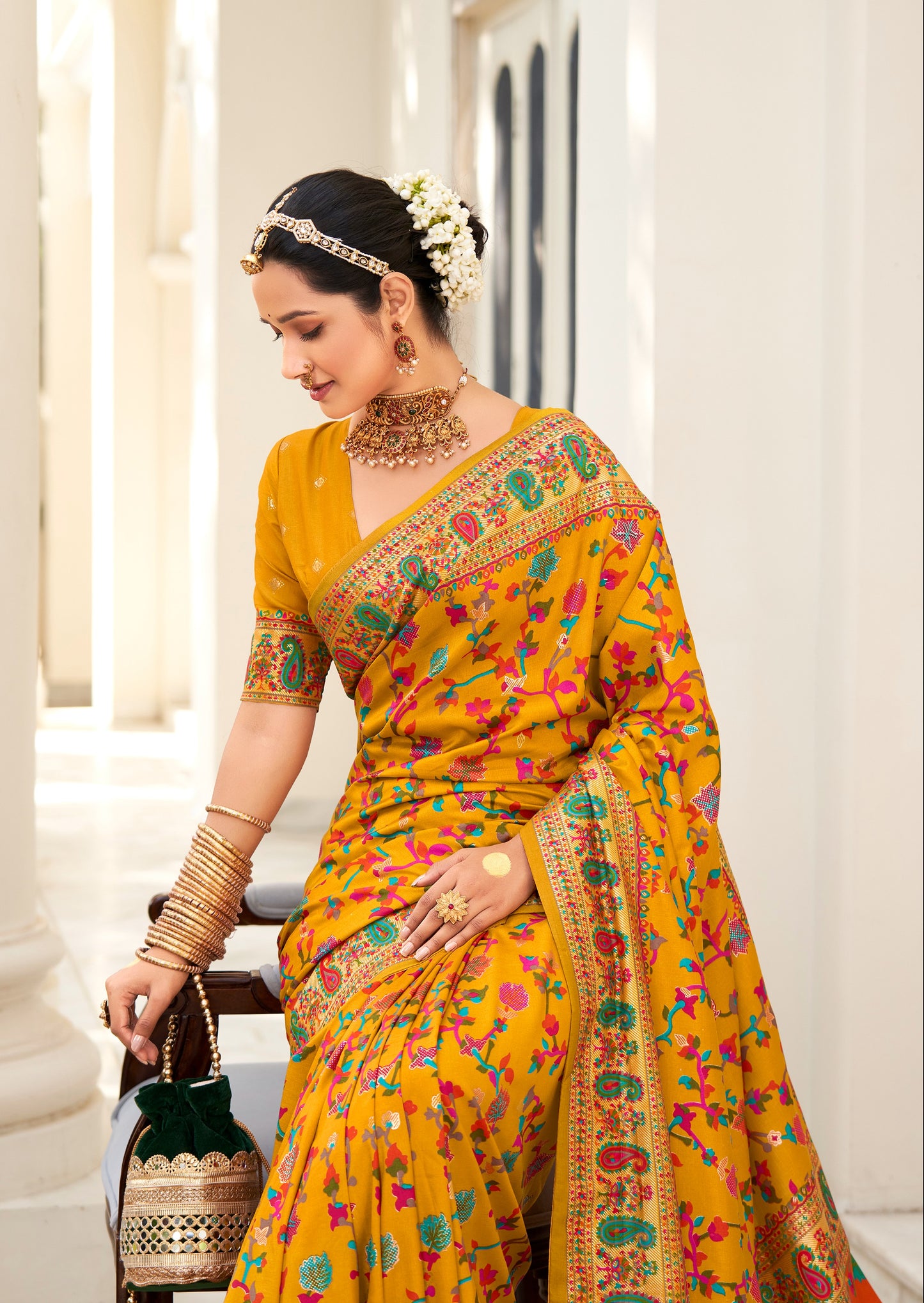 The Real Pashmina Silk fabric with Attractive All Over Print and Foil Touch with Keri Print & Grounded Tussels.