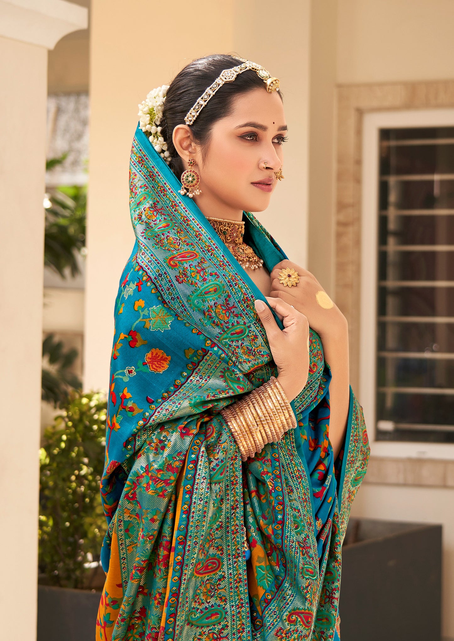 The Real Pashmina Silk fabric with Attractive All Over Print and Foil Touch with Keri Print & Grounded Tussels.